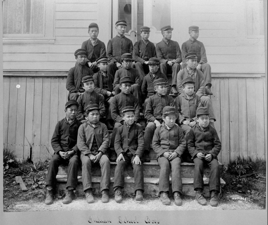 Metlakatla Indian Residential School, group of students posing on outside steps, date unknown